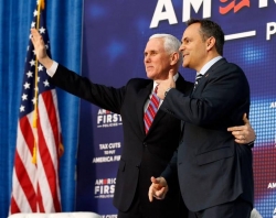 Vice President Mike Pence with Kentucky Gov. Matt Bevin. Credit to Charles Bertr